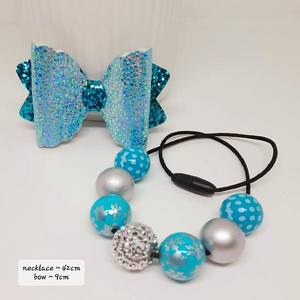 Aqua bead and bow
